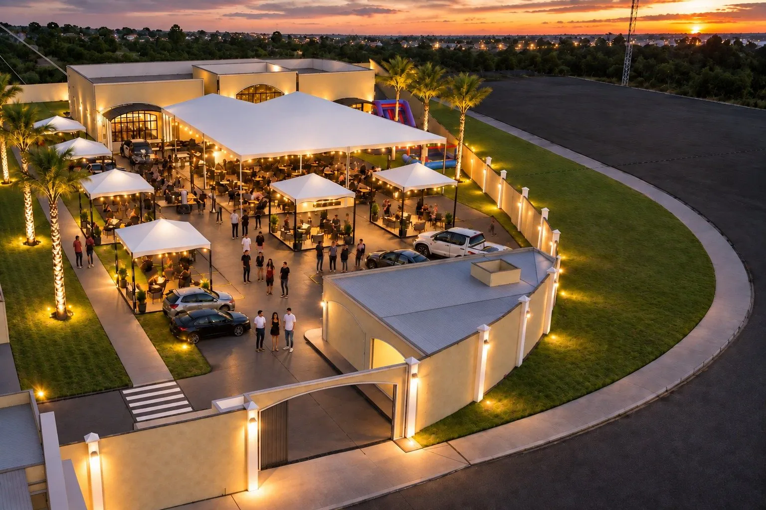 Projeção em 3D do salão de festas e da área externa do Residencial Treviso ao entardecer